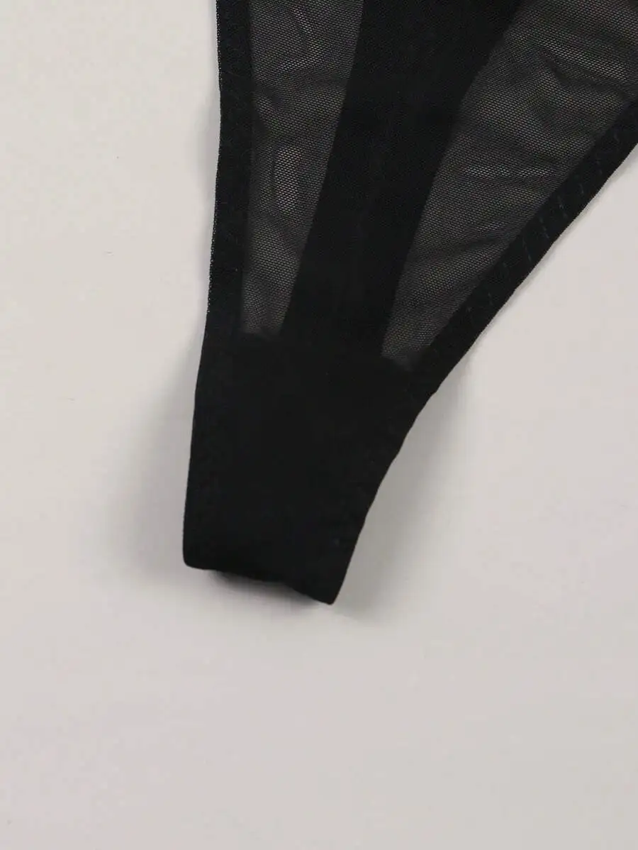 

Black Mesh Breathable Thong Underwear For Women With Printed Slogan Designed For Evening Wear