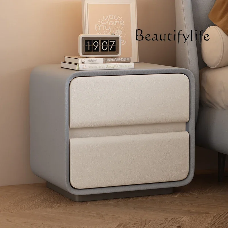 Cream wind bedside table high sense light luxury new round Nordic style simple modern floor