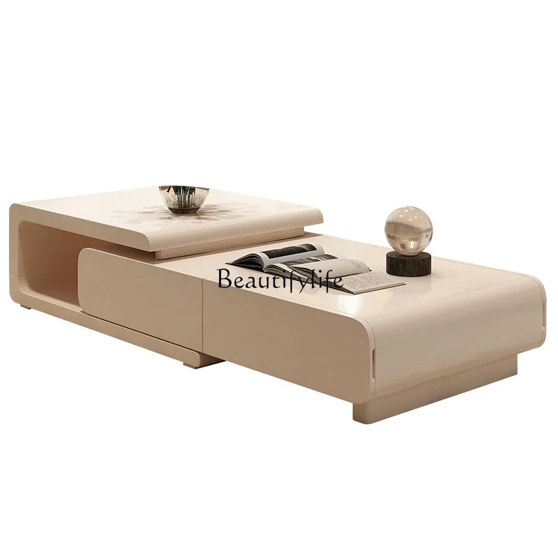 

Cream wind coffee table modern simple small apartment advanced sense wabi sandy wind retractable household coffee table