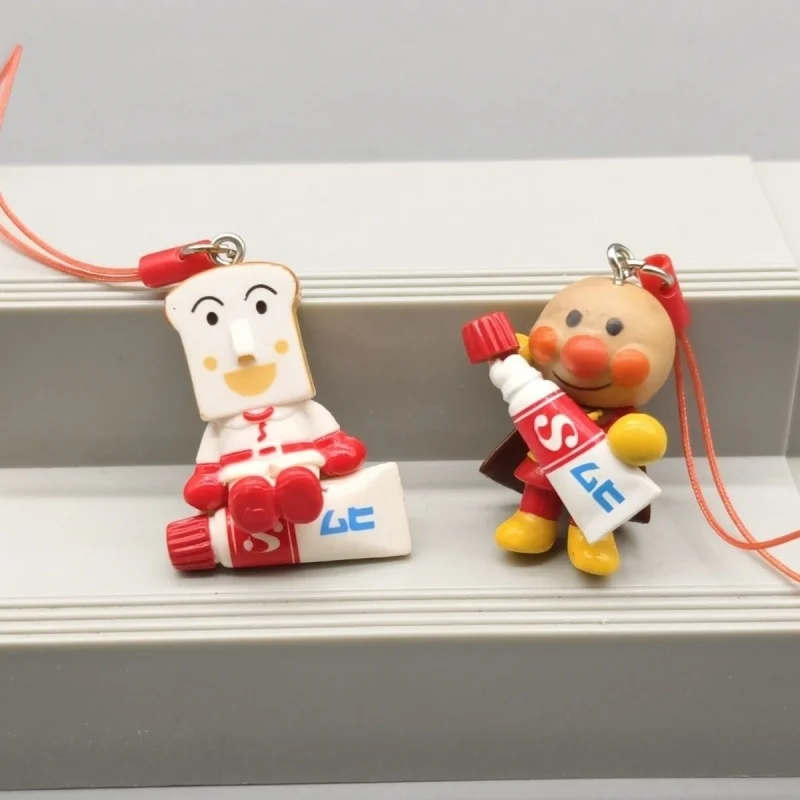 Llavero de la serie de pasta de dientes de dibujos animados Bandai Anpanman Shokupanman, estuche de papelería con cremallera, decoración Kawaii, colgantes para mochila