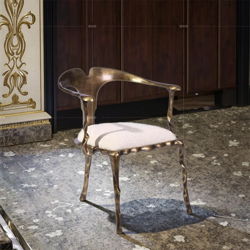 

Italian stainless steel dining chair light luxury high-end restaurant home armchair high-end villa creative fabric back chair