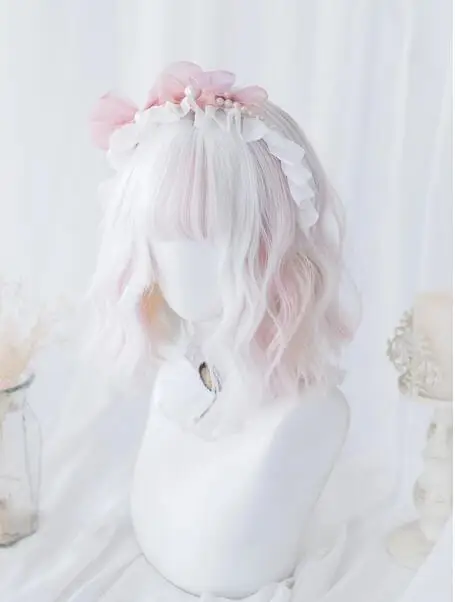 White pink two tone hair paired with short natural wavy wig