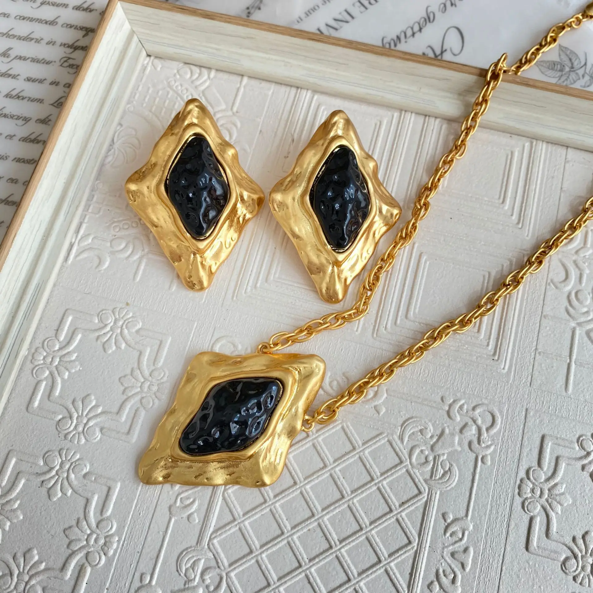 Gold irregular exaggerated hand burned lava glass diamond earrings necklace set