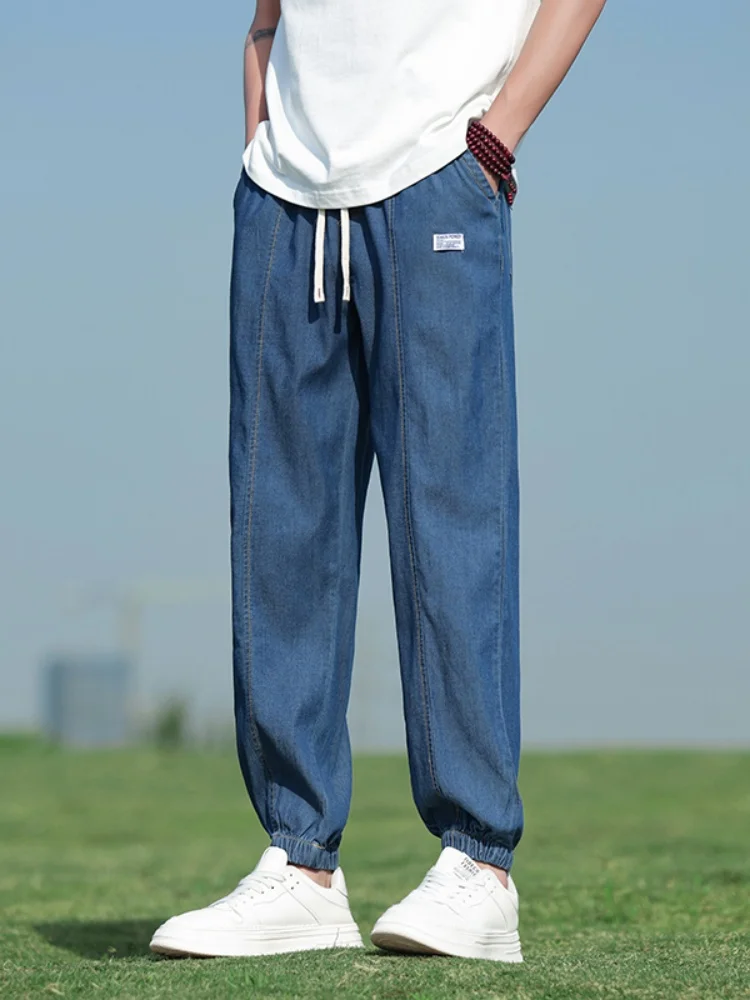 

Мужские джинсы из денима: модные брендовые брюки премиум-класса из ледяного шелка, летние тонкие свободные брюки-харланы с отворотами в американском стиле