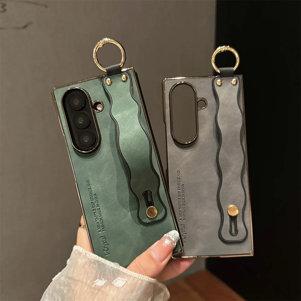 Luxuriöse PU-Leder-Handyhülle für Samsung Galaxy Z Fold mit Handschlaufe, Armbandhalterung, Handständer-Abdeckung für 7, 6, 5, 4, 3, 5G