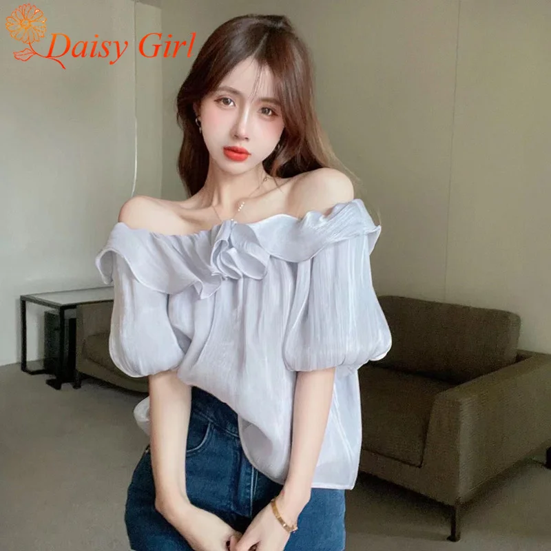 夏の新ソリッドカラーの気質ワンショルダーパフスリーブトップガールデザインニッチトップスフリルトレンディなオフショルダーシフォンシャツ