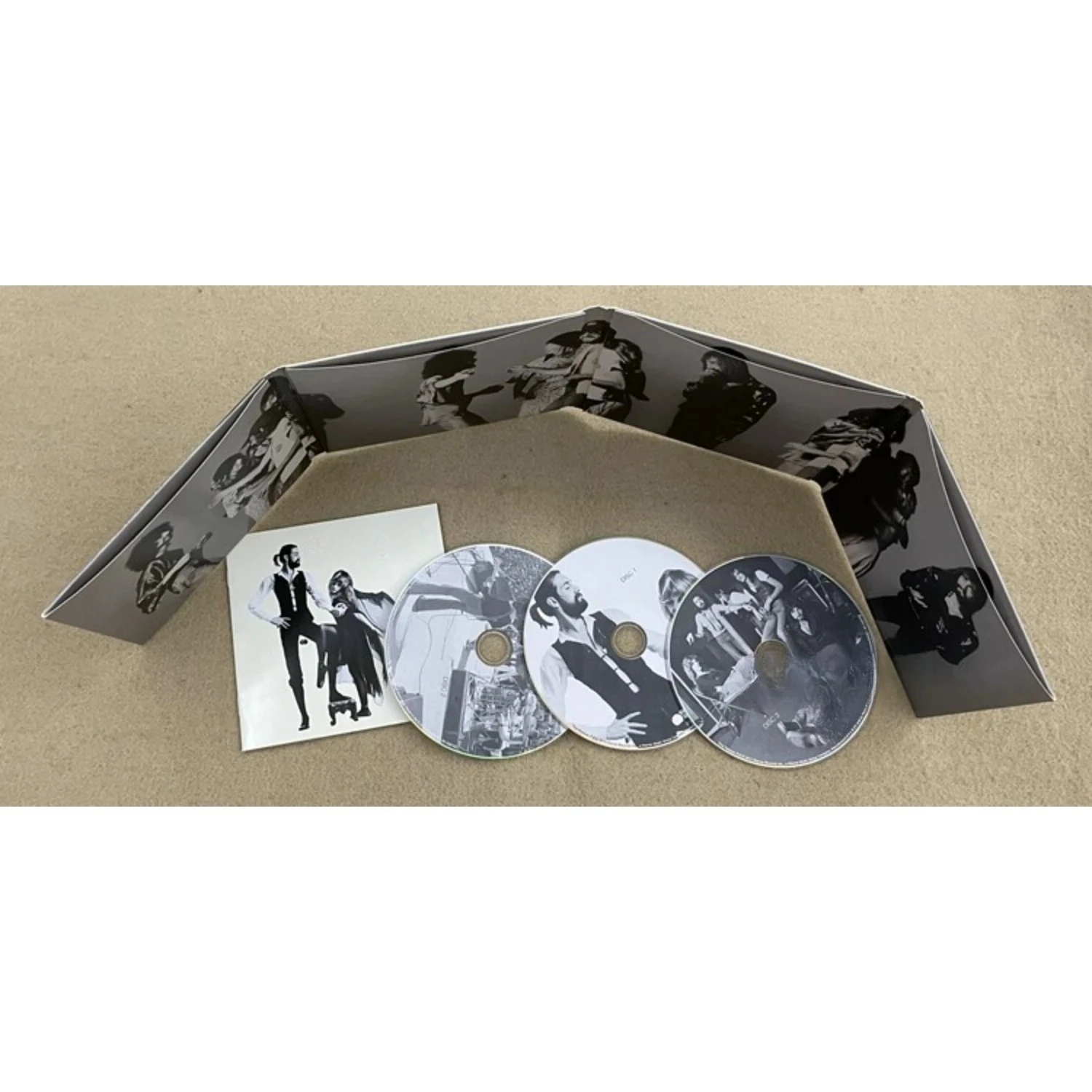 Rock Music CD Album with Retro Black-and-White Couple Silhouette Cover Elegant Design & Classic Tracks Creating A Nostalgic Vibe view 5
