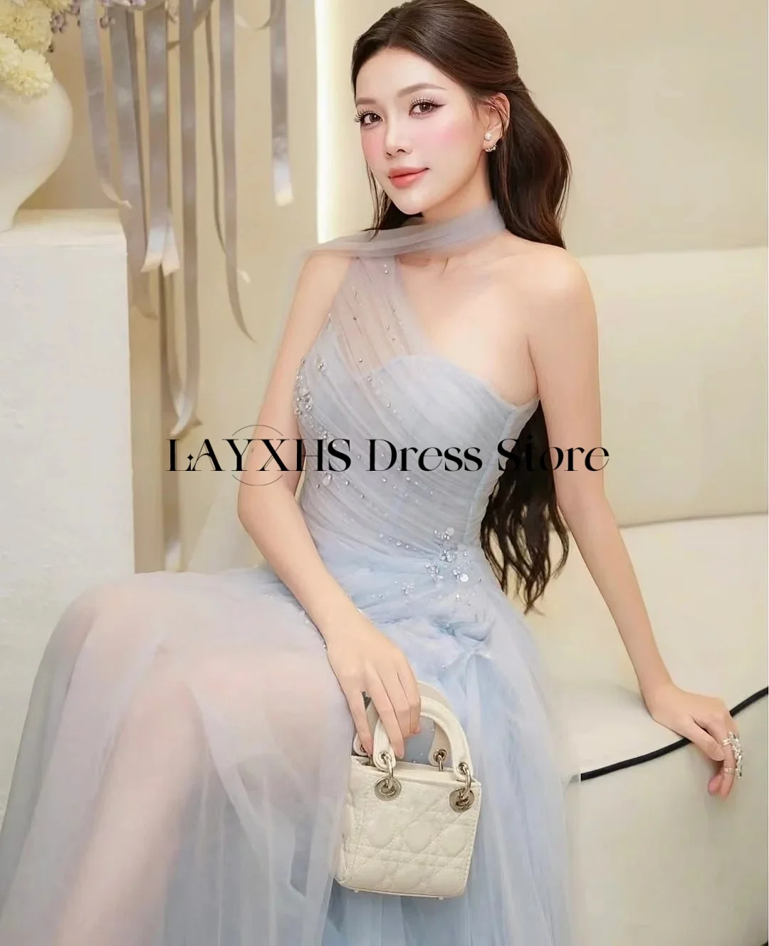 LAYXHS Neuartiges lila One-Shoulder-Abendkleid Tüll A-Linie Perlenschal Heimkehrkleid Maßgeschneidert فسات musica