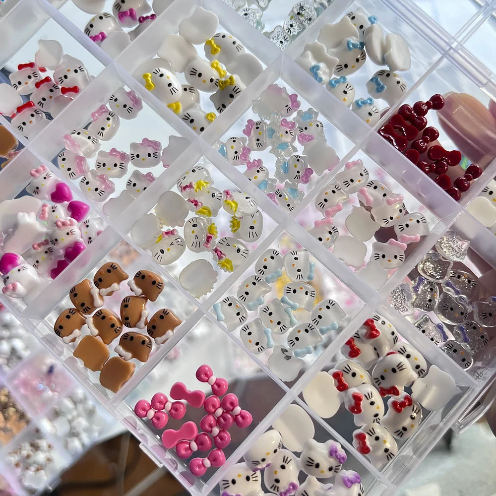 24 rejillas de dibujos animados bonitos de Hello Kitty, dijes para decoración de uñas, cabezas KT 3D rosa/bronceado, decoraciones para uñas con lazo, accesorios para uñas de verano Kawaii DIY