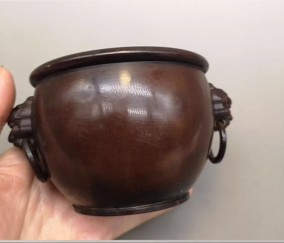 

Bronze cylinder decoration