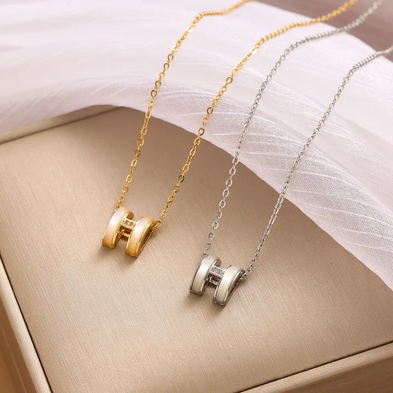 

Камень «кошачий глаз» H, инкрустированный бриллиантами, кулон из титановой стали для женщин, модный, простой и высококачественный дизайн