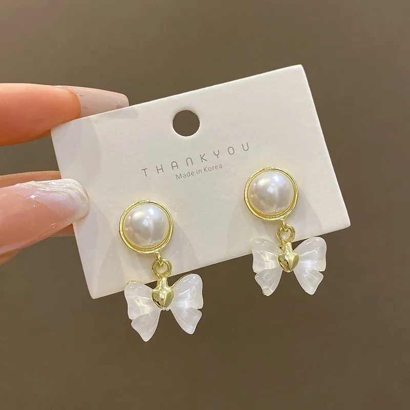 925 Silver Needle Korean Fashion Pearl Bowknot Earrings For Women Jewelry 2026 Trending New Women's White Bow Drop Earrings