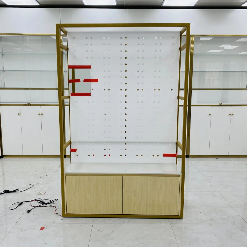 

Стенд-витрина Customized.Gold Frame из перфорированного картона с тумбой для хранения аксессуаров/мелких предметов, для демонстрации очков