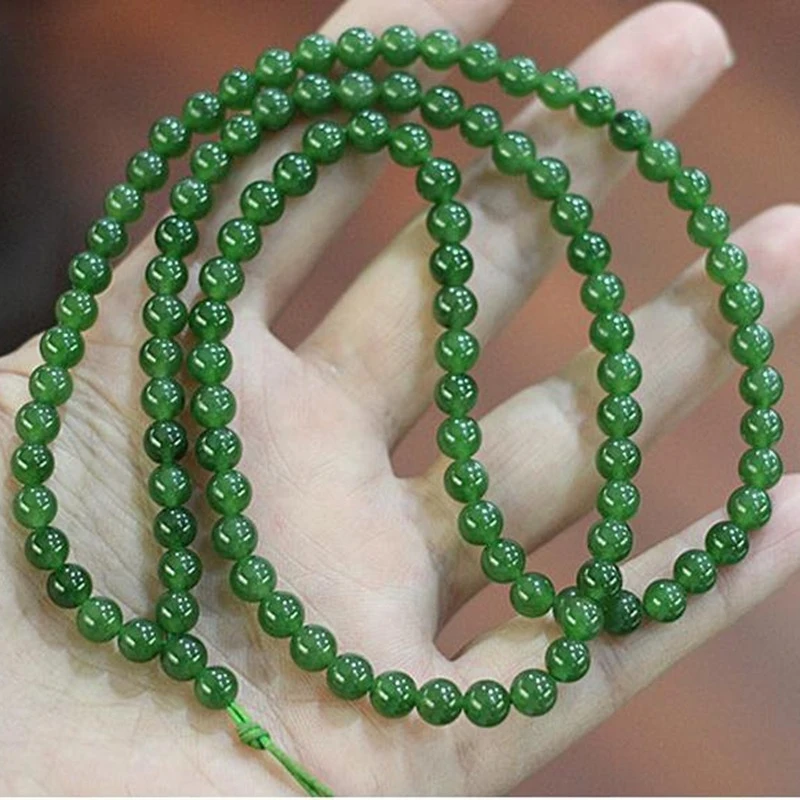 

Нефритовое ожерелье из хэтяньского жадеита, старинное, цвета шпинатного зеленого, 108 бусин, с подвесным шнурком.