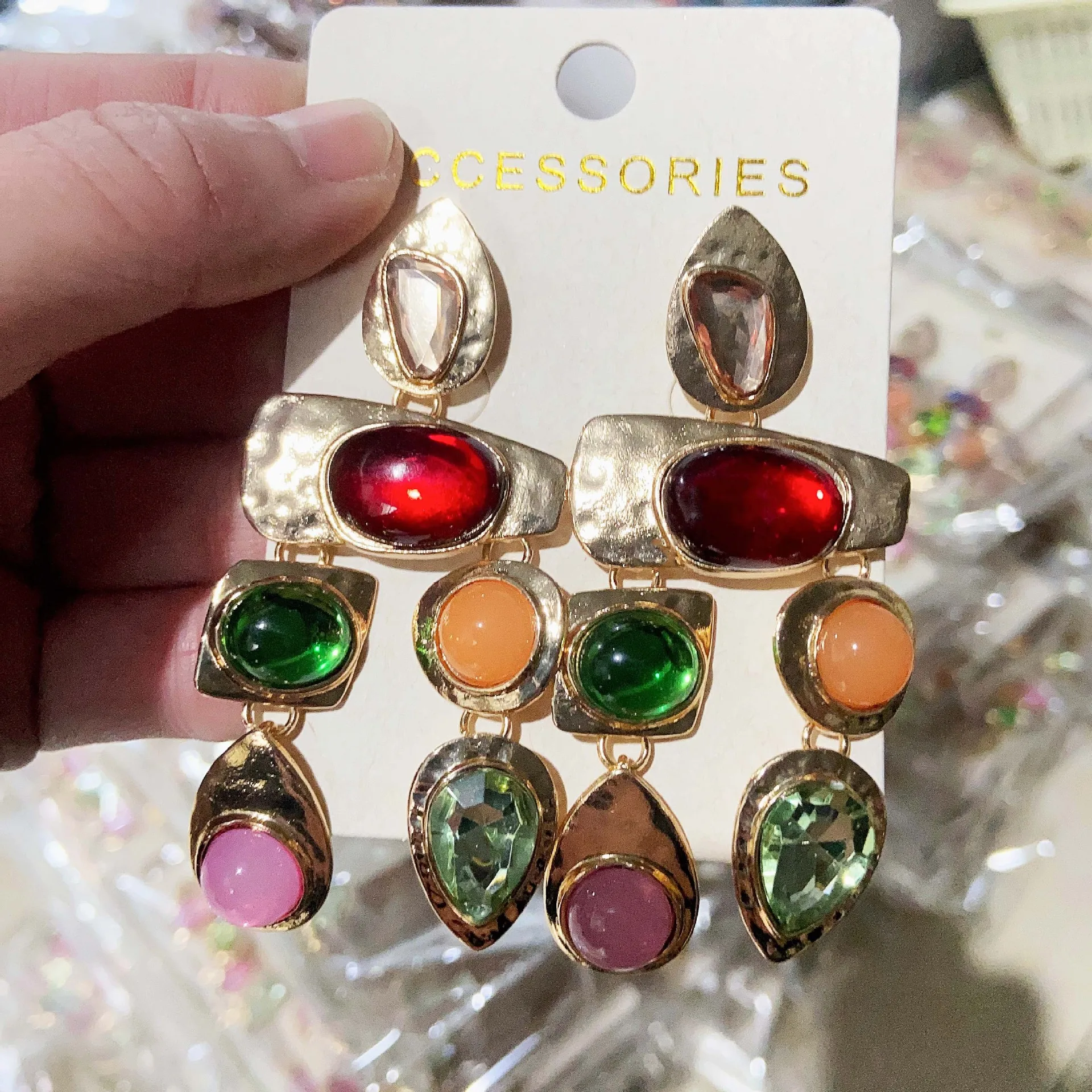 The same style on the official website, exaggerated retro catwalk style, colored gemstone inlaid earrings, personalized decorati