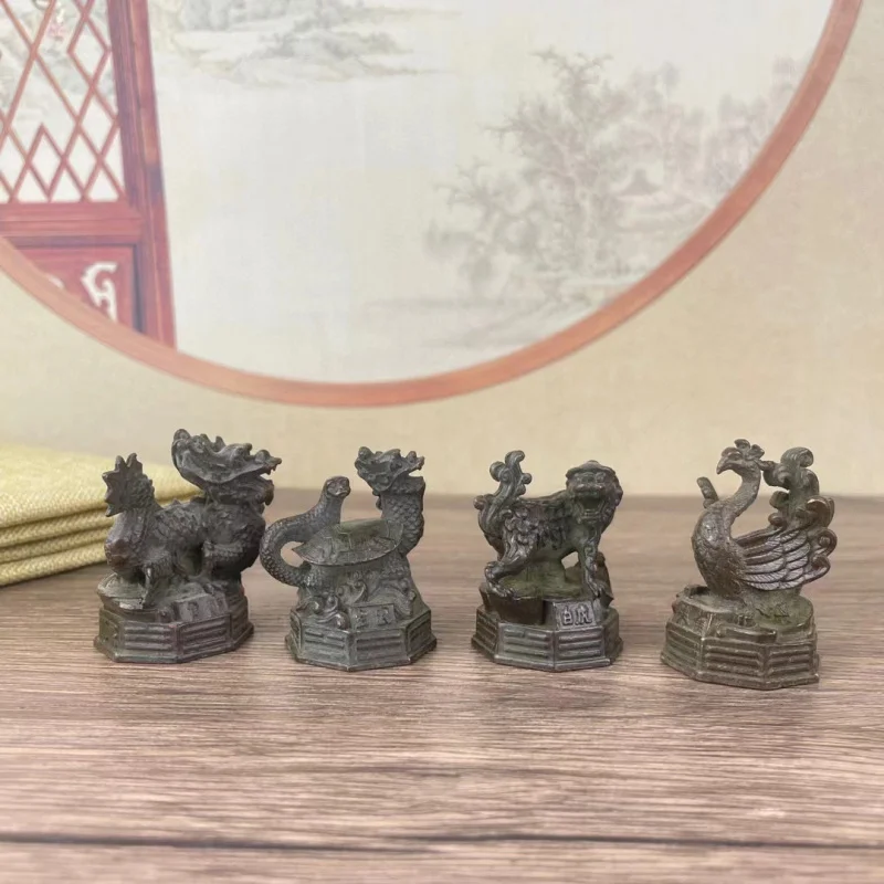 Divine Beasts Figurines: Green Dragon, White Tiger, Vermilion Bird, and Black Tortoise. A set of bronze four-beast figurines.