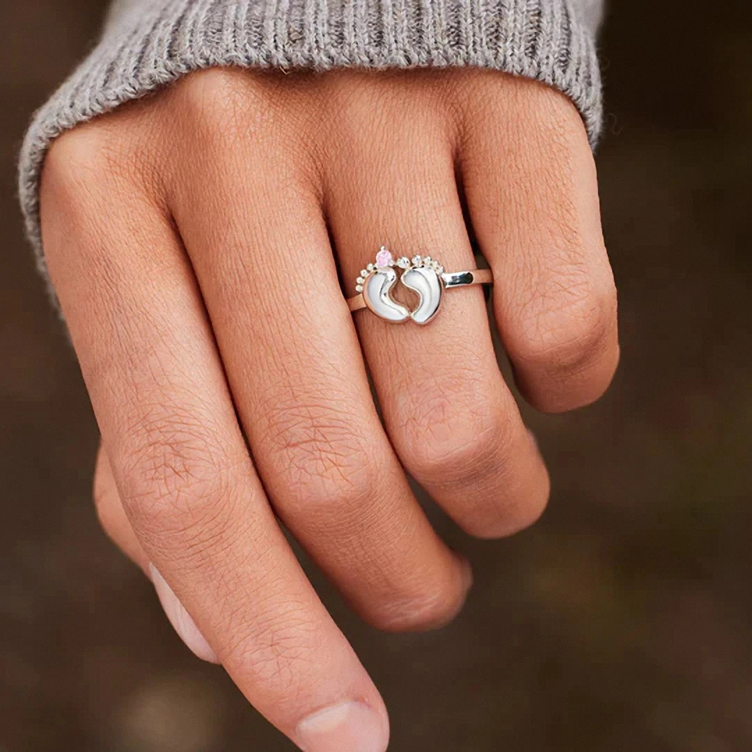 Huitan-Anillo de Plata de Ley 925 con forma de pie de bebé para mujer, sortija con circonita rosa, accesorio cálido para Dedo de madre, joyería de fiesta diaria