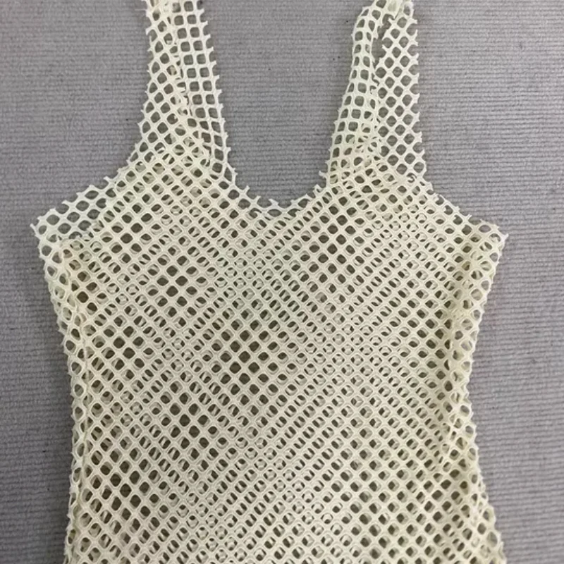 2026 europeu americano doce picante estilo feminino vestido de malha sheer magro oco para fora na moda festa casual outfit