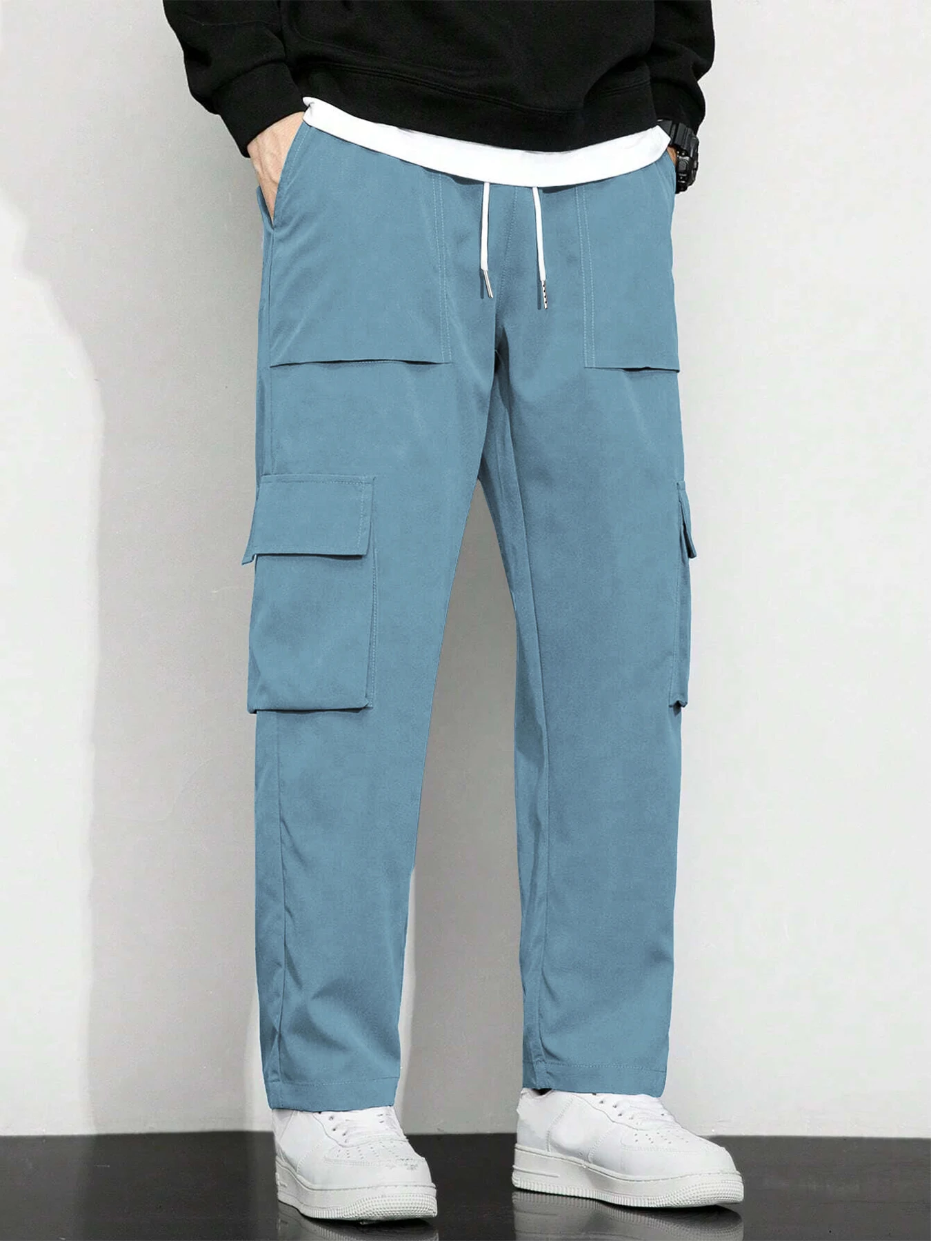 

Мужские новые однотонные рабочие брюки с завязками на талии и множеством карманов, стильные и модные спортивные повседневные рабочие брюки.