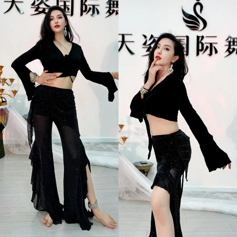 ชุดฝึกซ้อมระบำหน้าท้องแบบสวีกัลสั่งทำพิเศษ เสื้อแขนผ่าผูกโบว์คู่ พร้อมกางเกงลูกไม้ชายระบายใหญ่ผ้าไหมวิบวับ