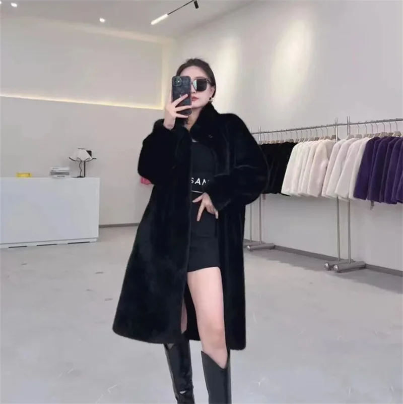 2025 Design Sense nuevo abrigo de piel sintética chaqueta de piel integrada para mujer cortavientos peludo suave grueso de longitud media prendas de vestir exteriores