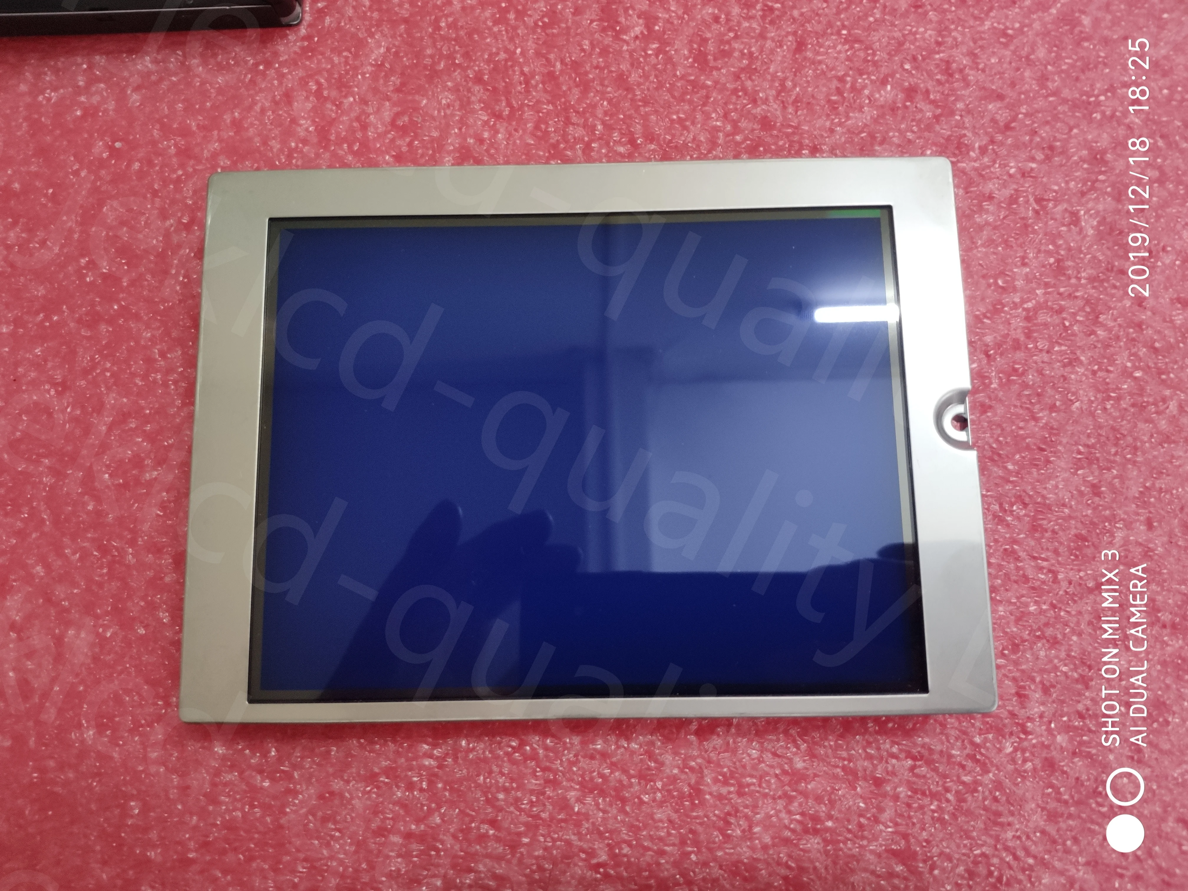 

A 5.7-inch KG057QVLCD-G310 with box Industrial LCD panel, display blue film