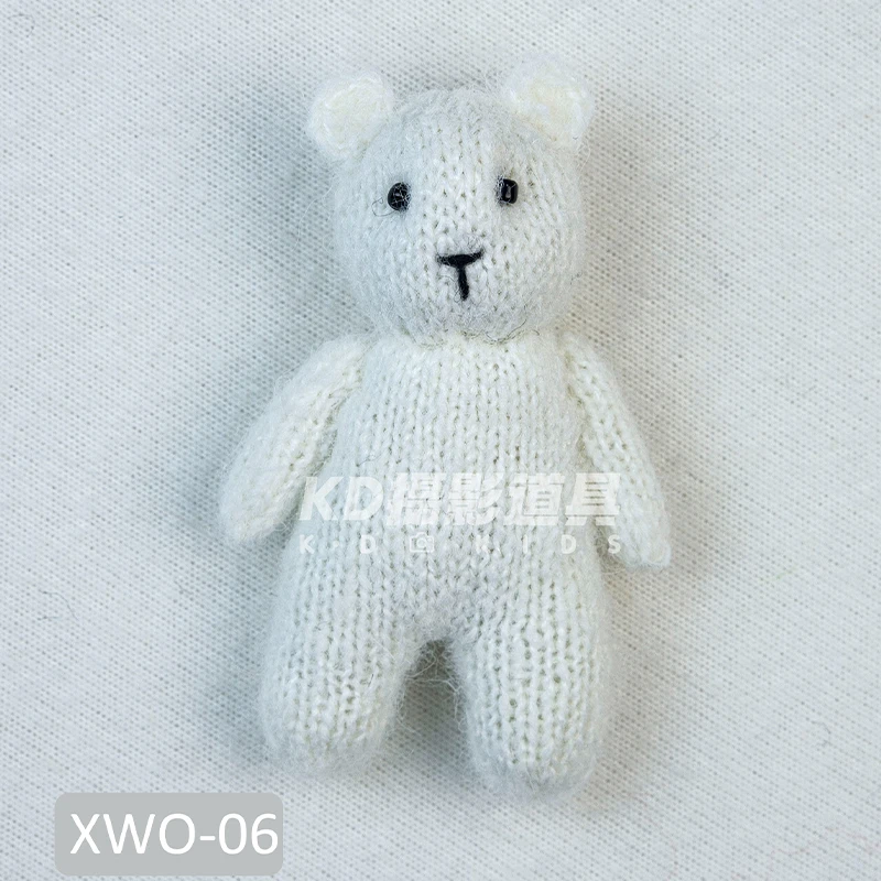 Giocattolo di orsacchiotto lavorato a maglia mini bambola fatta a mano Fotografia di neonato Prop 15 * 10 * 5 cm Giocattolo di comfort per animali neonato Disponibile per l'acquisto sfuso