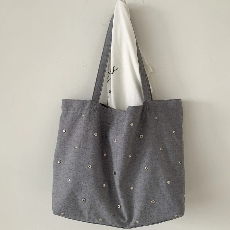 

Korean-style Magnetic Snap Women's Large Capacity Tote Bag 2026 Rivet Decoration Fashionable Solid Color Shoulder Underarm Bag