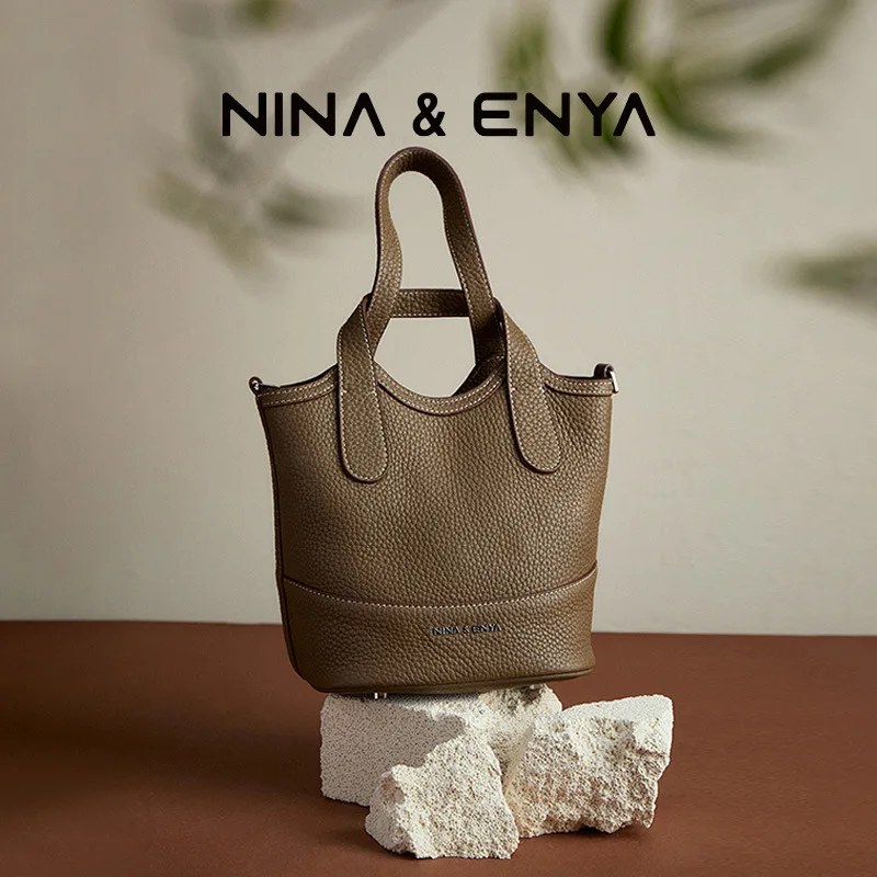 حقيبة سلة عصرية من NINA ENYA متوسطة الحجم حقيبة كروس من الجلد الطبيعي للنساء