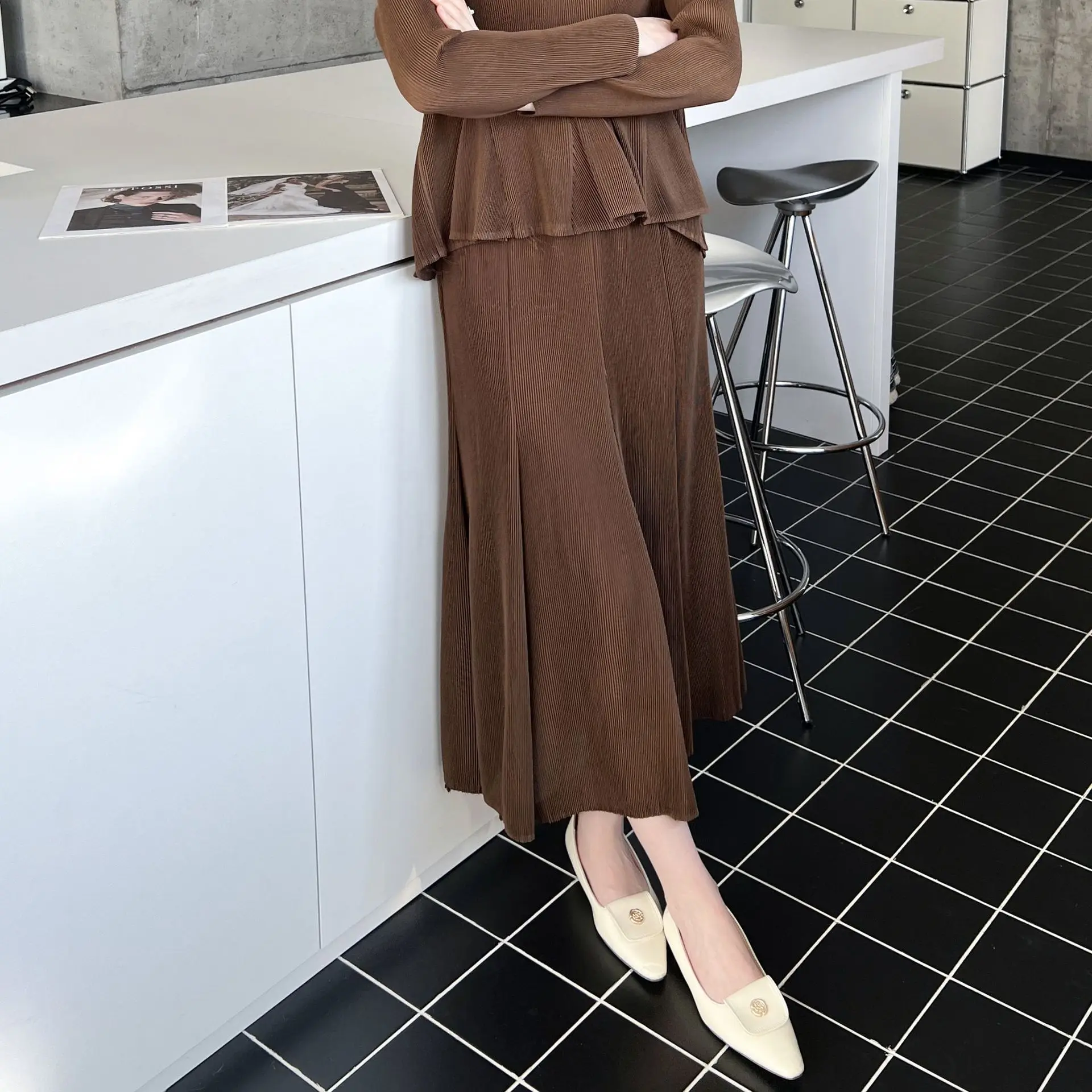 Miyake plisado 2026 otoño y primavera nueva ropa plisada de alta gama viajero cien con paquete falda de medio cuerpo de cola de pez a la cadera