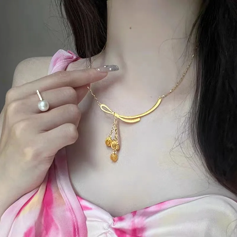 

AU999 24K Gold Tassel Hydrangea Chain | Gradient enamel - painted bow, pearl - adorned hydrangea, noble & elegant