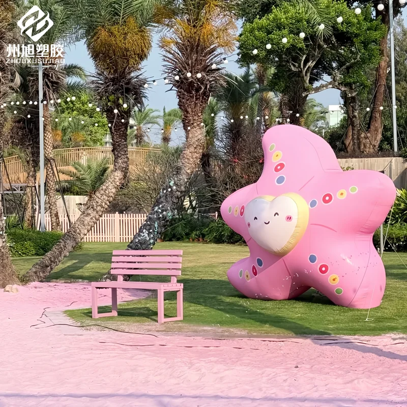 Cartoon opblaasbaar roze ster luchtmodel - decoratieve rekwisieten voor winkelcentra, buiten, aan zee en strandactiviteiten