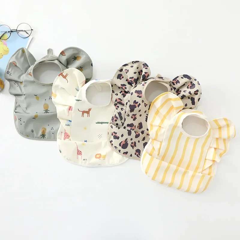 

Waterproof Pu Baby Bibs Angel Wings Design Danish Flying Sleeve Baby Feeding Bibs Insipidor For Infants Feeding Accessories