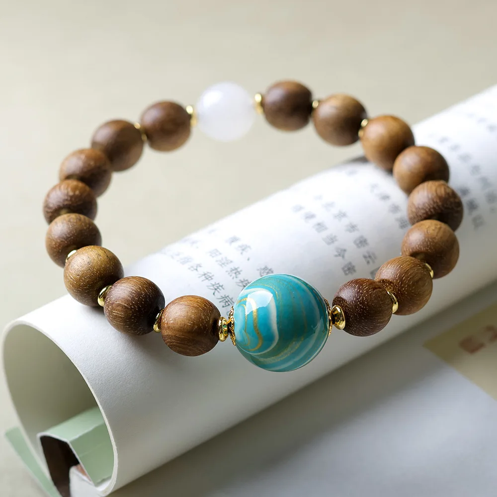 

Winter on the new yellow heather incense wood lantern beads bracelet original cultural game large lacquer Chinese string