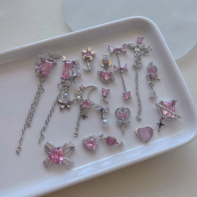 10 Stück koreanische japanische neue rosa Zirkon Anhänger Schmetterling Silber Bogen Liebe Blume Zauberstab Nail Art Schmuck