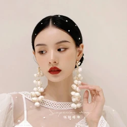 Korean gentle senior sense exquisite Lily of the valley bud handmade white tassel extra long flower earring bridal accessories