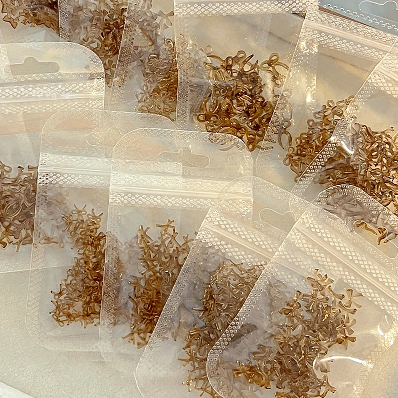 50 pezzi di decorazioni per nail art con fiocco di colore marrone, ciondoli creativi per unghie con fiocco per cravatta da caffè, per disegni di unghie fata fai da te