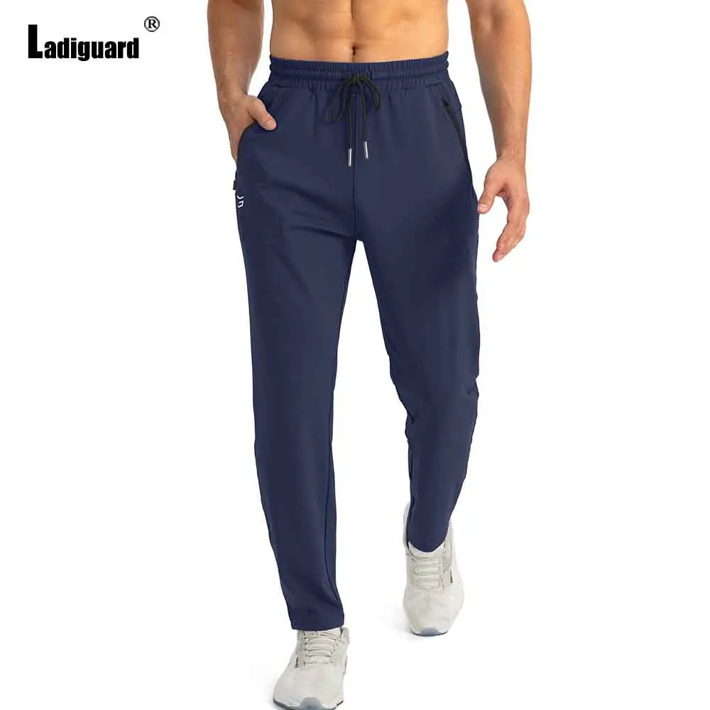 

2025 Men's Fitness Sports Run Board Pants Solid Navy Trouser Plus Size Mens Casual Straight Pants Male Ankle-Length Bottoms New