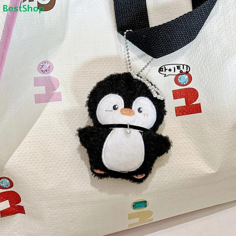

❀❀Cute Fluffy Penguin Bag Charm – Kawaii Plush Keychain with Pearl Bead for Backpack & Purse Decor