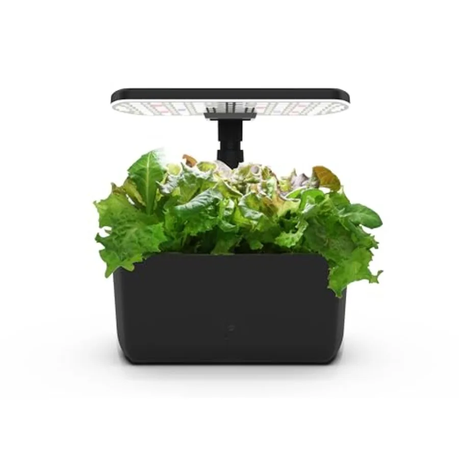 Indoor hydroponic garden for year-round herb and vegetable growing; black plastic; soil-free with LED grow light; compact AeroG