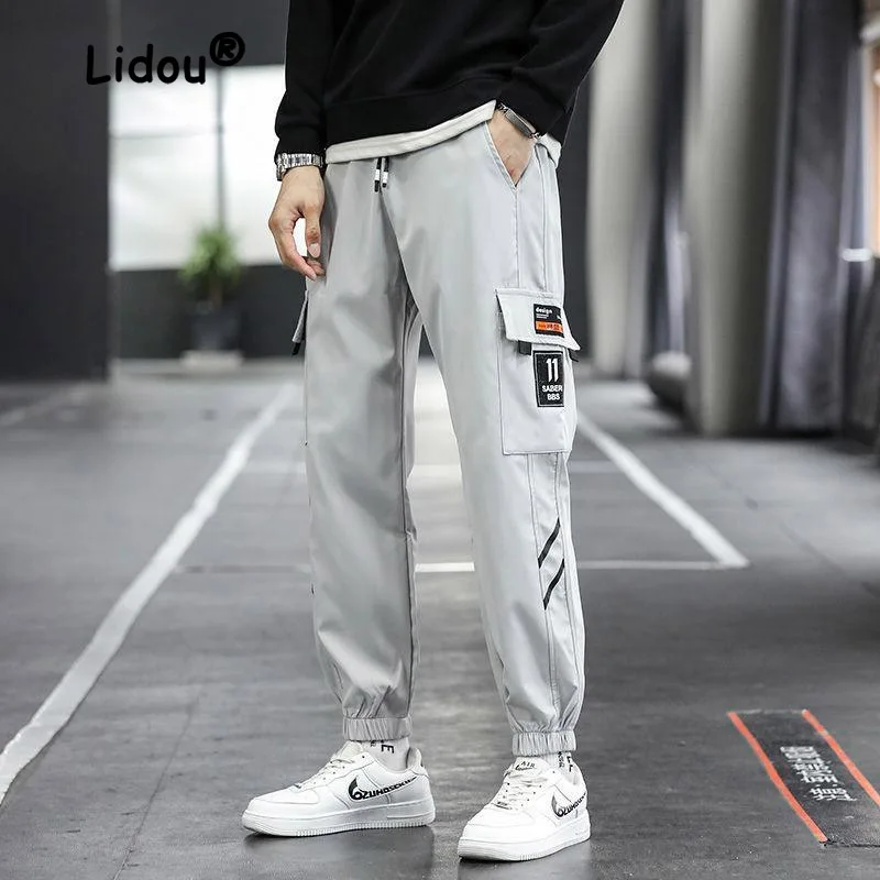 

Fashion Thin Patch Loose Men's Cargo Pants Multiple Pockets Waist Drawstring Tie One's Feet Straight Cylinder Male Trousers