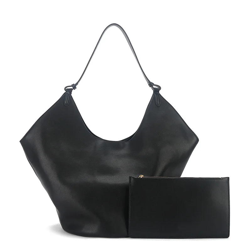 

The same style of the same commuting armpit bag of the big brand,the trendy niche design tote bag,the one-shoulder cowhide pouch