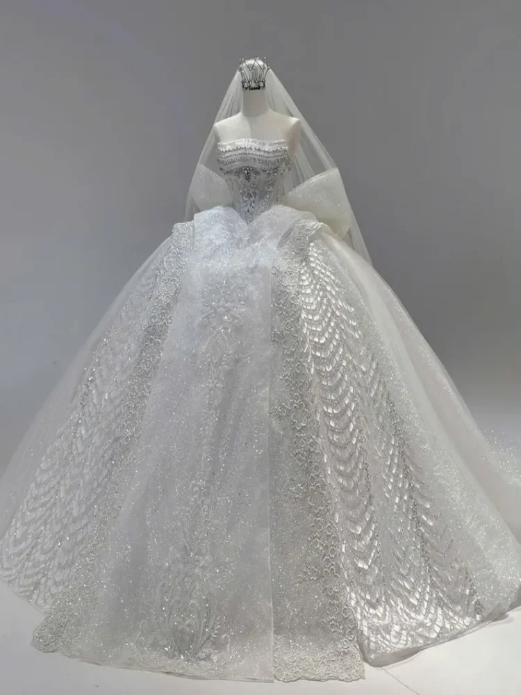 

Customized 2025 Luxury Crystal Bead Wedding Dress With Off The Shoulder Shimmering Design Oversized Bow And Long Tail