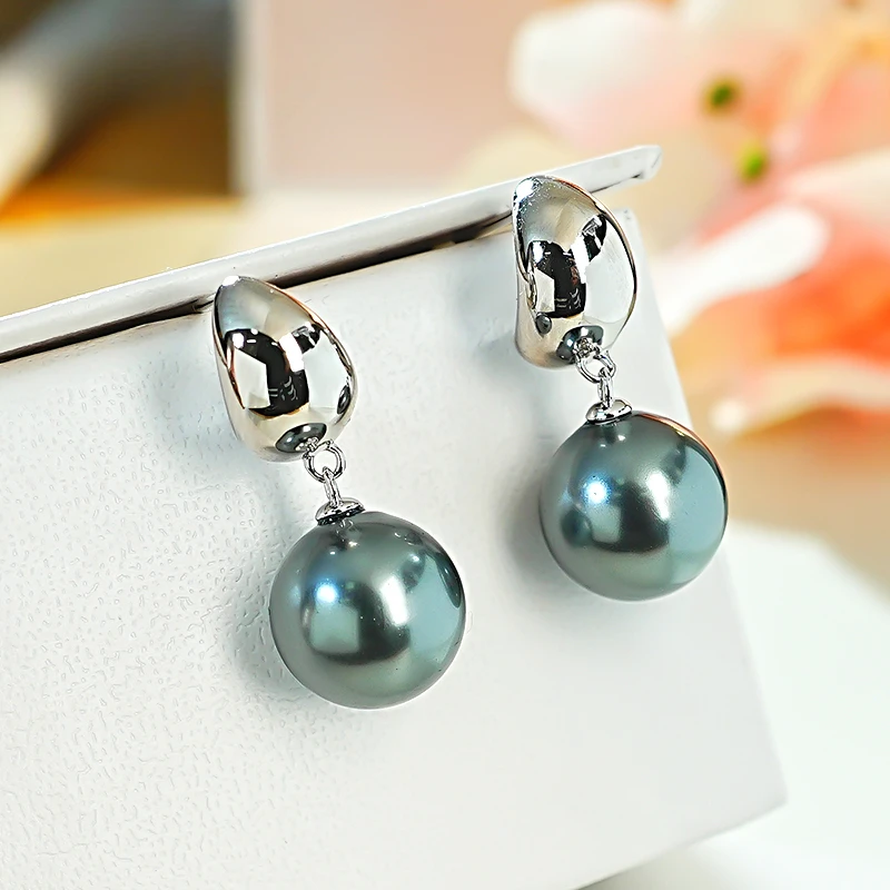 

Hepburn Style Tahitian Fritillaria Pearl 925 Silver Ear Pendant Set with Elegant and Elegant Women's Versatile Design