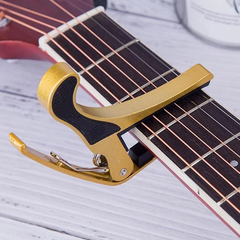 Nuovo capotasto per chitarra in lega di alluminio Morsetto a cambio rapido per la regolazione del tono della chitarra classica acustica 1PC