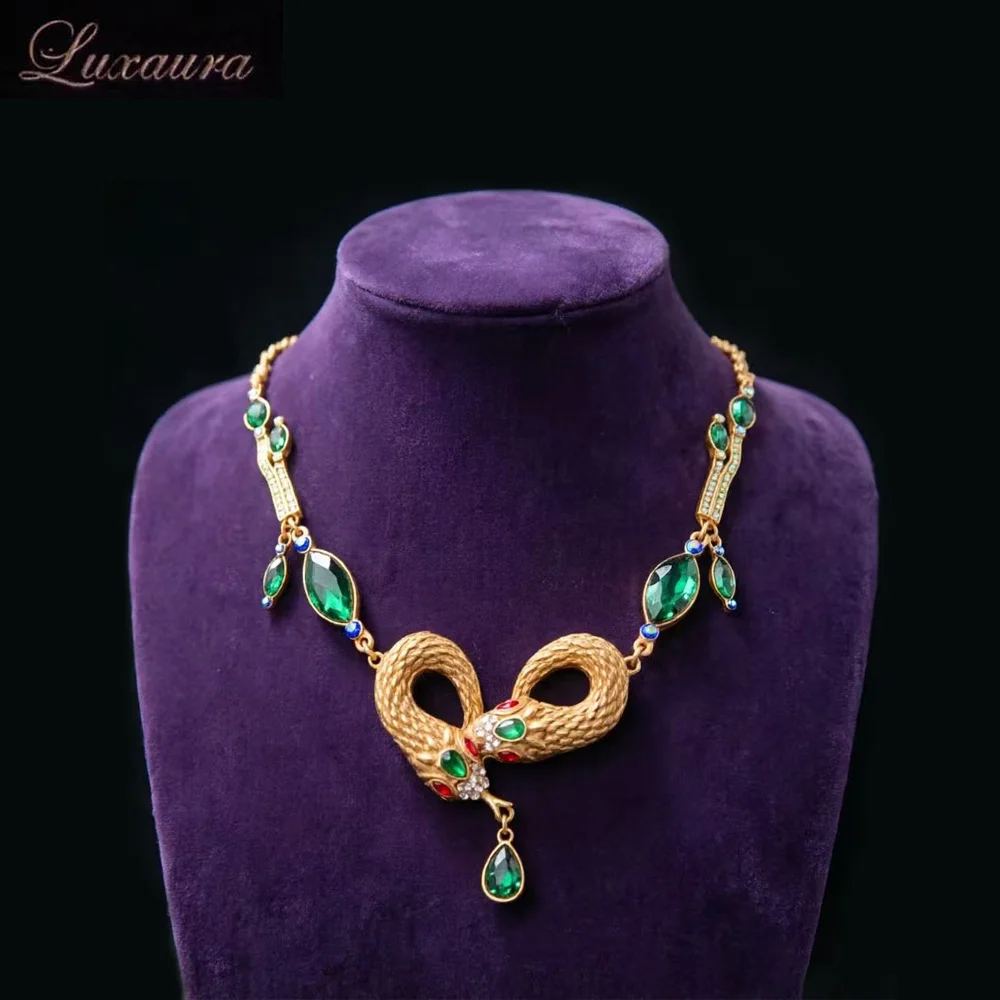 

Vintage jewelry featuring a fashionable and classic gold geometric necklace design paired with Bohemian style women's necklace