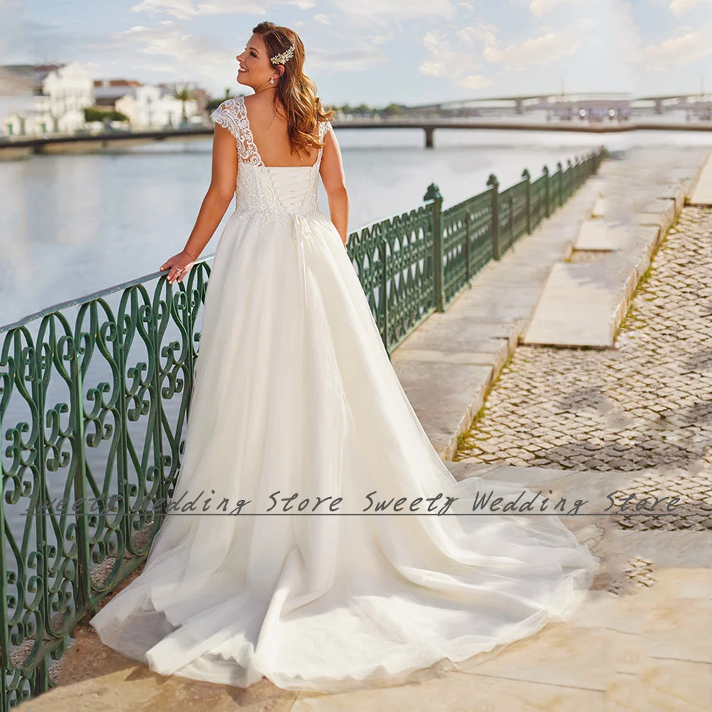 Soft Tulle Wedding Dresses A Line Stunning Cap Sleeve V Neck Sequined Applique Sweep Train Corset Bridal Gown Plus Size