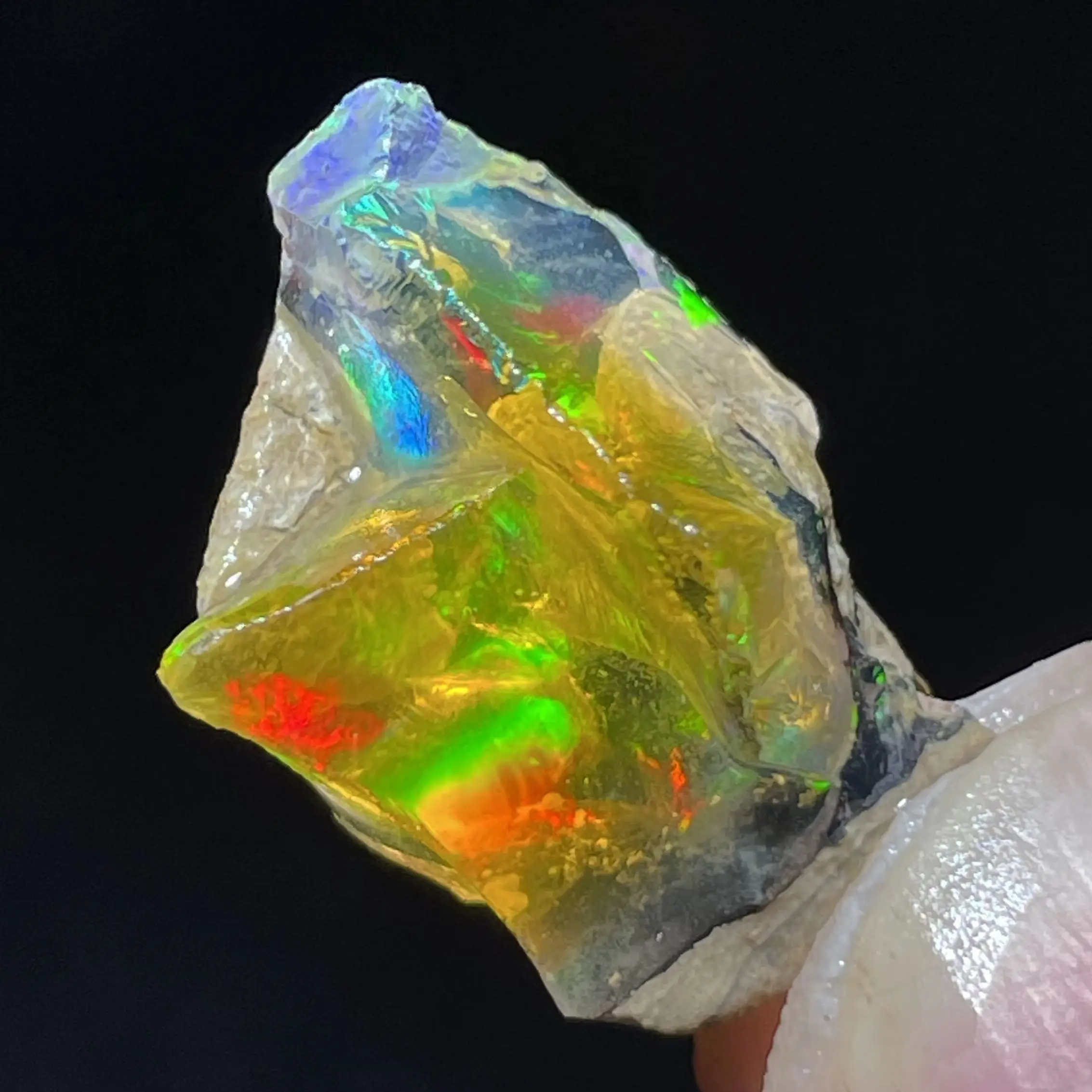 Natural Colorful Ethiopia Opal (Need In Water) Rare Gem Stone Mineral Healing Quartz Crystals Gemstone Shooting Under Lighting view 2