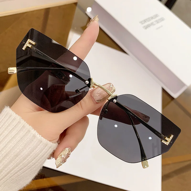 New letter inlaid diamond sunglasses for women with a sense of luxury, frameless cut edge sunglasses, cross-border fashion metal