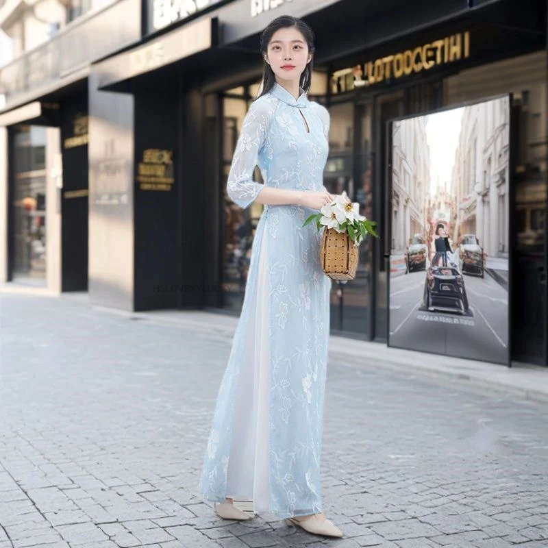 ملابس السنة الصينية التقليدية الجديدة للمرأة فستان شيونغسام التطريز خمر الإناث تشيباو الشرقية فيتنام أوداي فستان